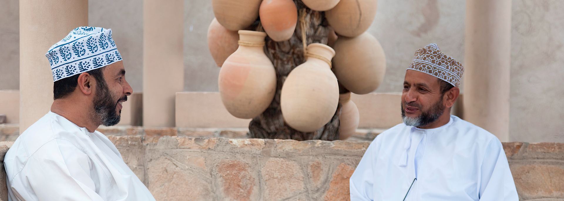 Local men chatting in Nizwa